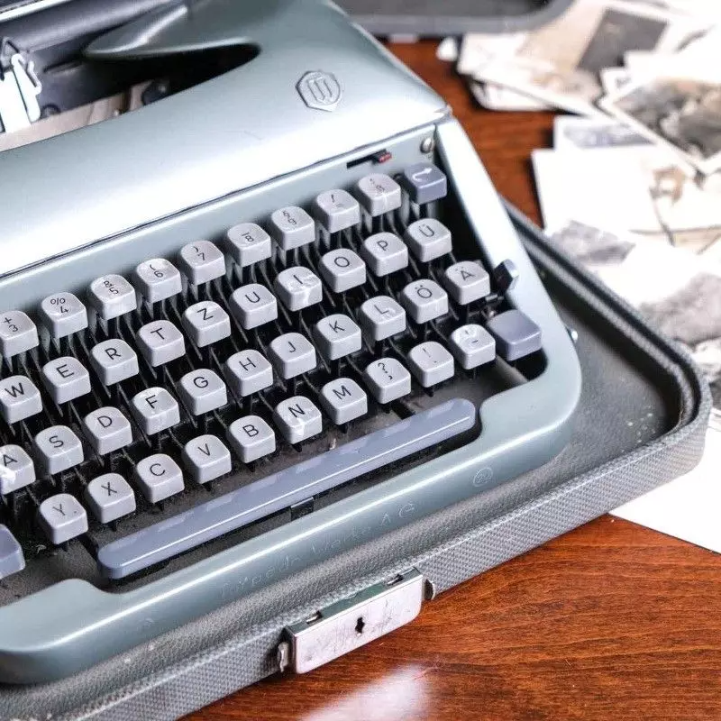 Torpedo brand typewriter with vintage bag.
