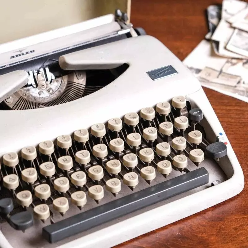 Adler brand typewriter with vintage bag