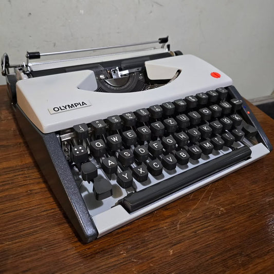 1960's Germany  Olympia brand SF De Luxe model portable typewriter