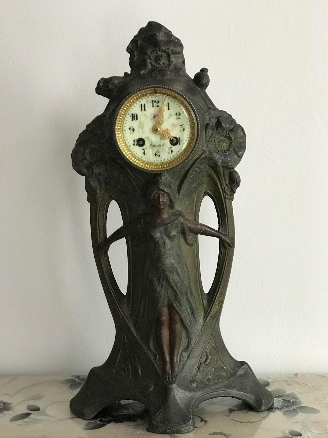 20th century bronze-plated Art Nouveau style French cast metal antique clock.