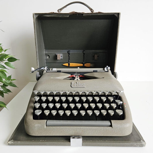 Erika Model 10 a portable working vintage typewriter from the 1950s. In awesome condition, with case, unusual gift, retro office