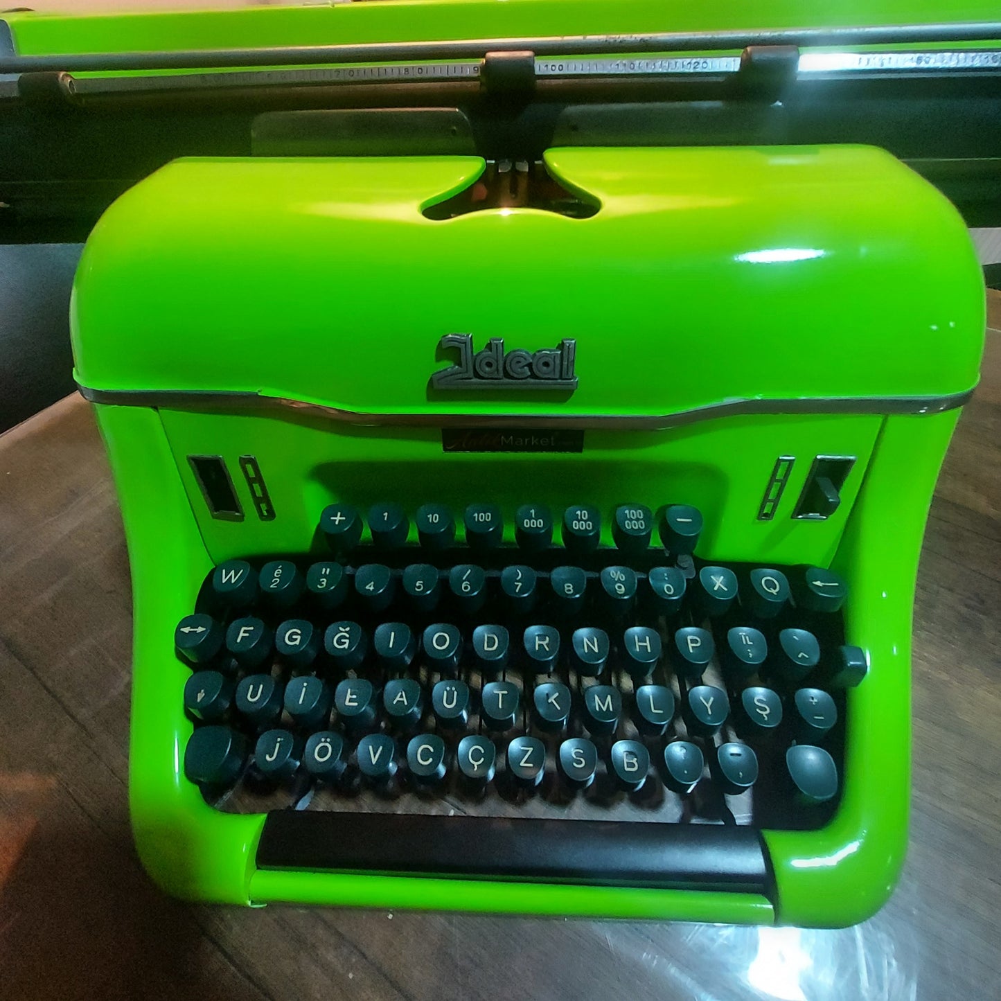 A magnificent 1955 model IDEAL antique pistachio green typewriter