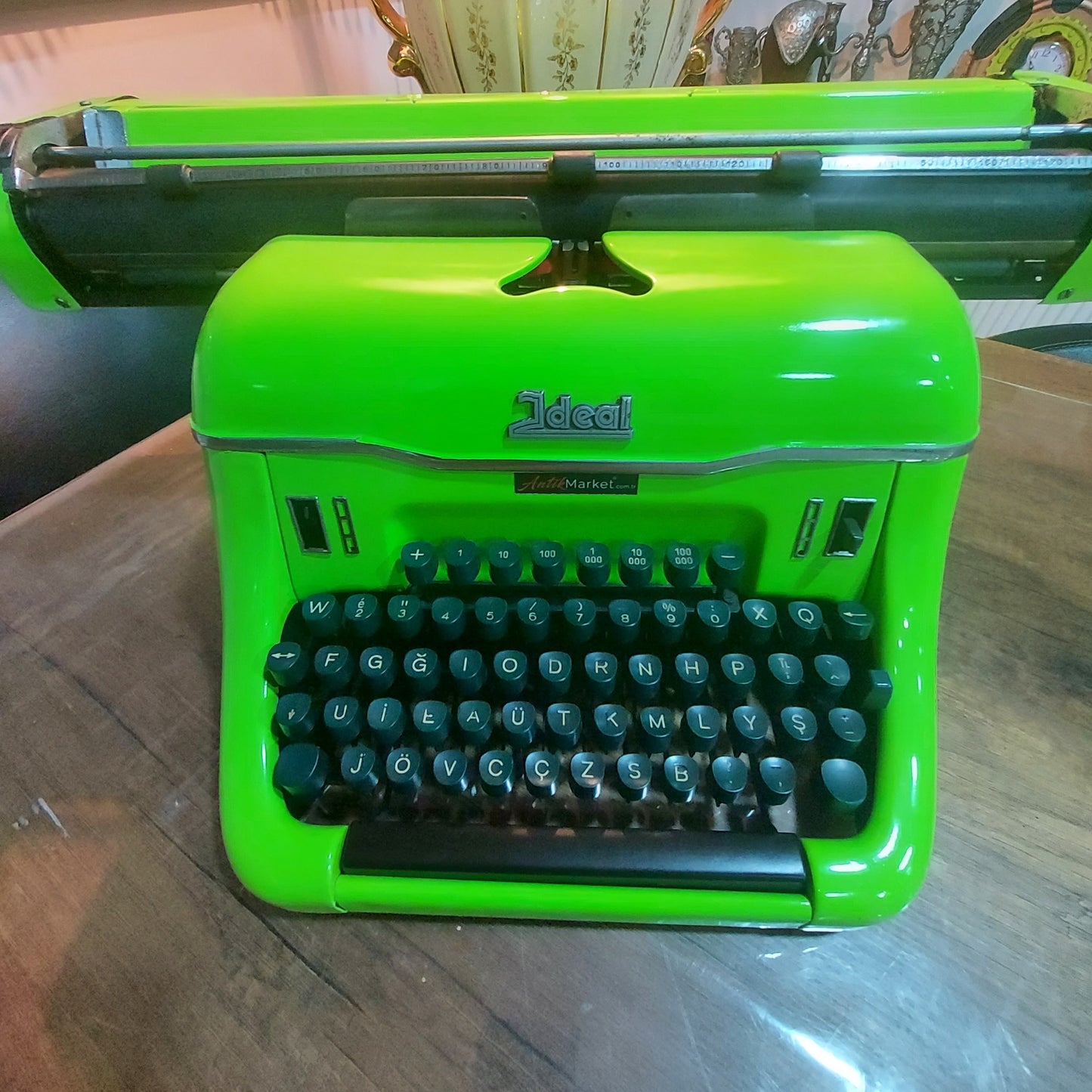 A magnificent 1955 model IDEAL antique pistachio green typewriter