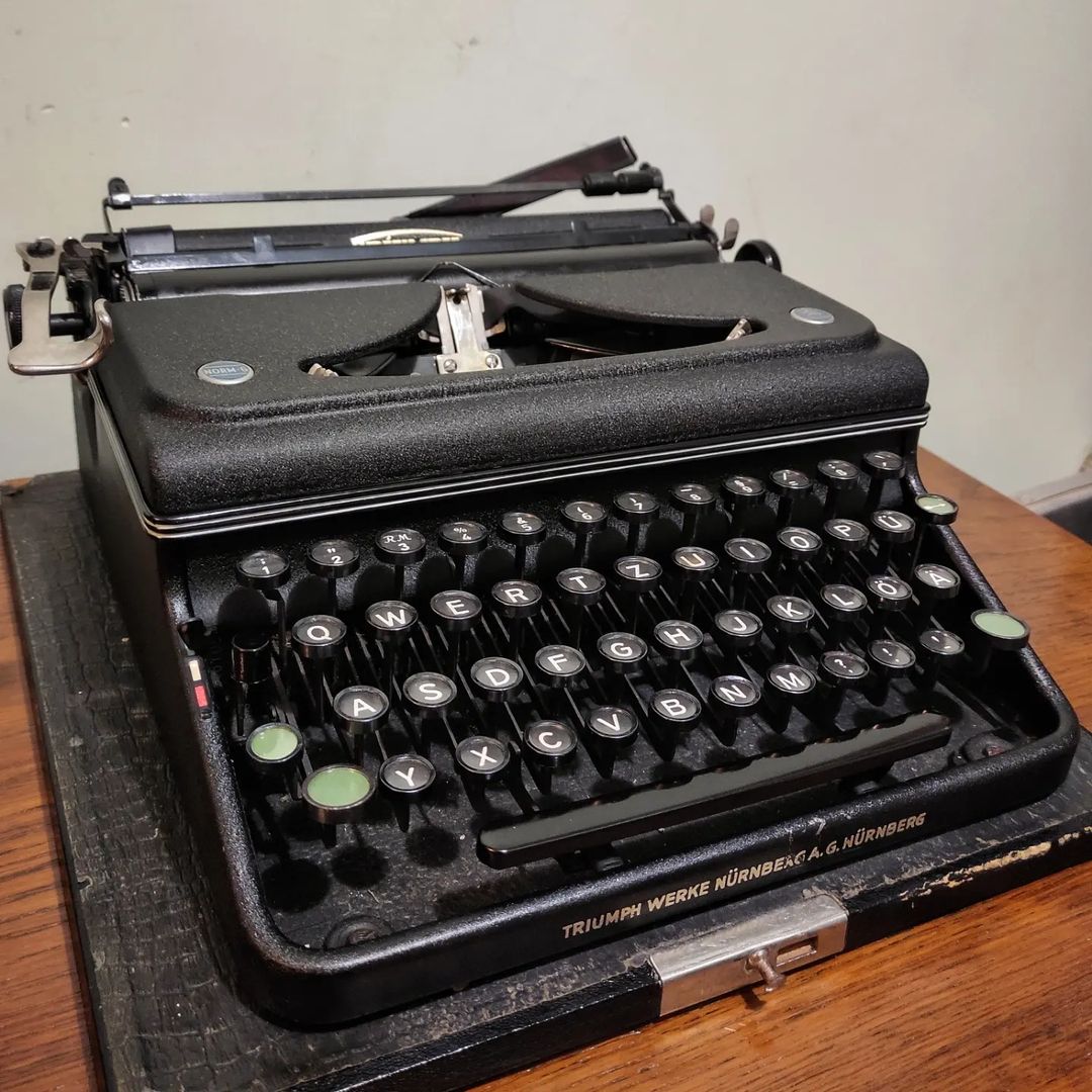 Triumph brand Norm 6 model portable typewriter