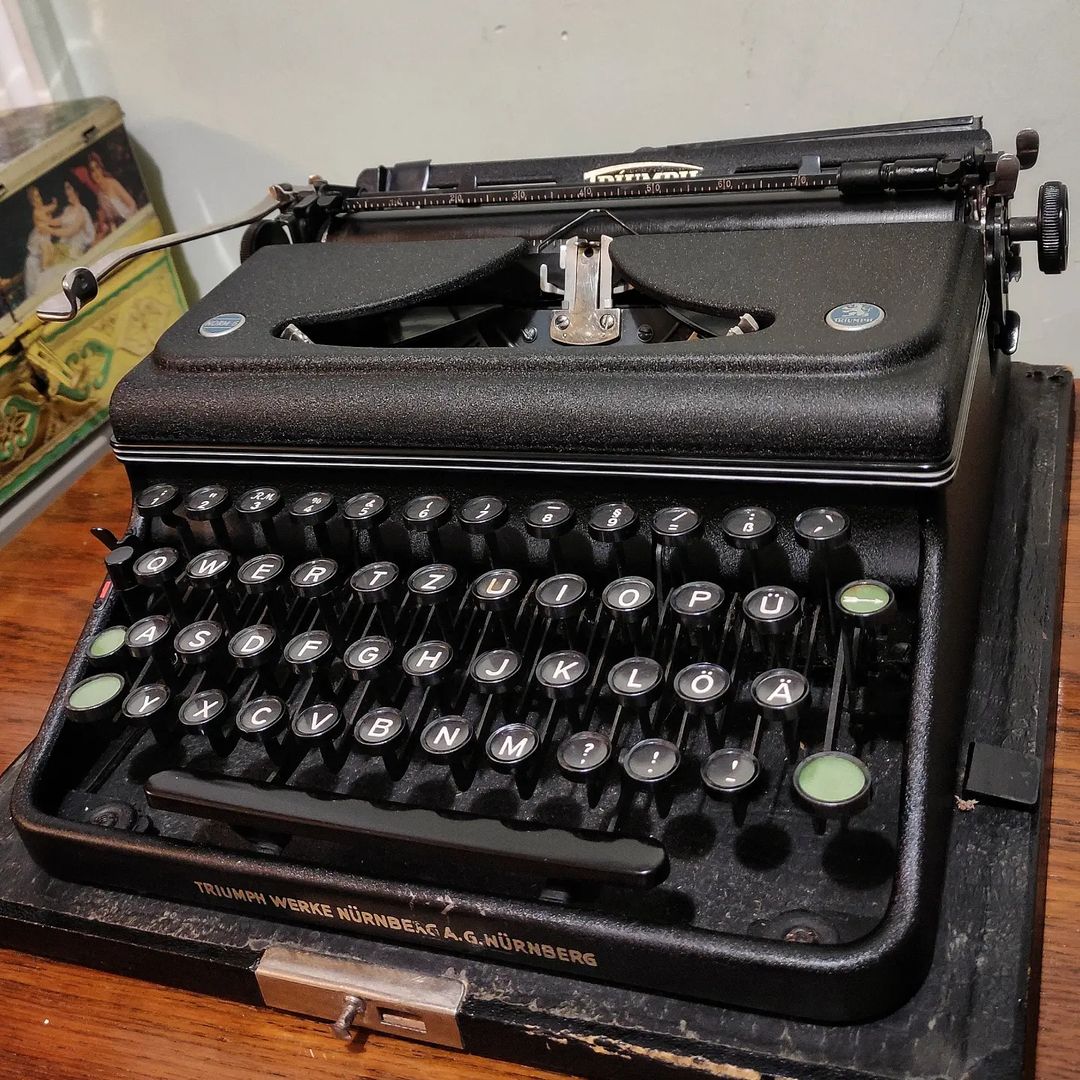 Triumph brand Norm 6 model portable typewriter