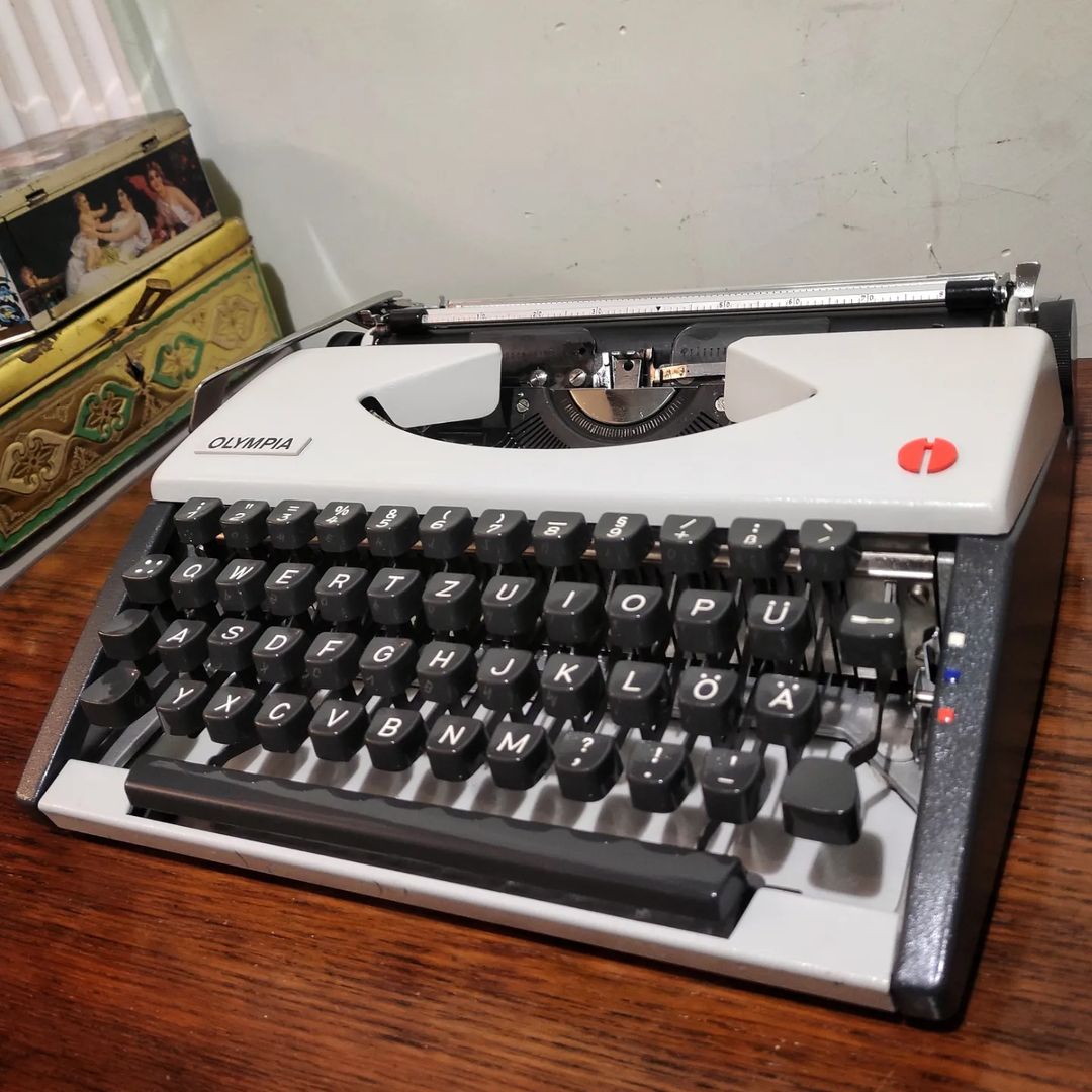 1970's Germany  Olympia brand Traveller De Luxe model portable typewriter